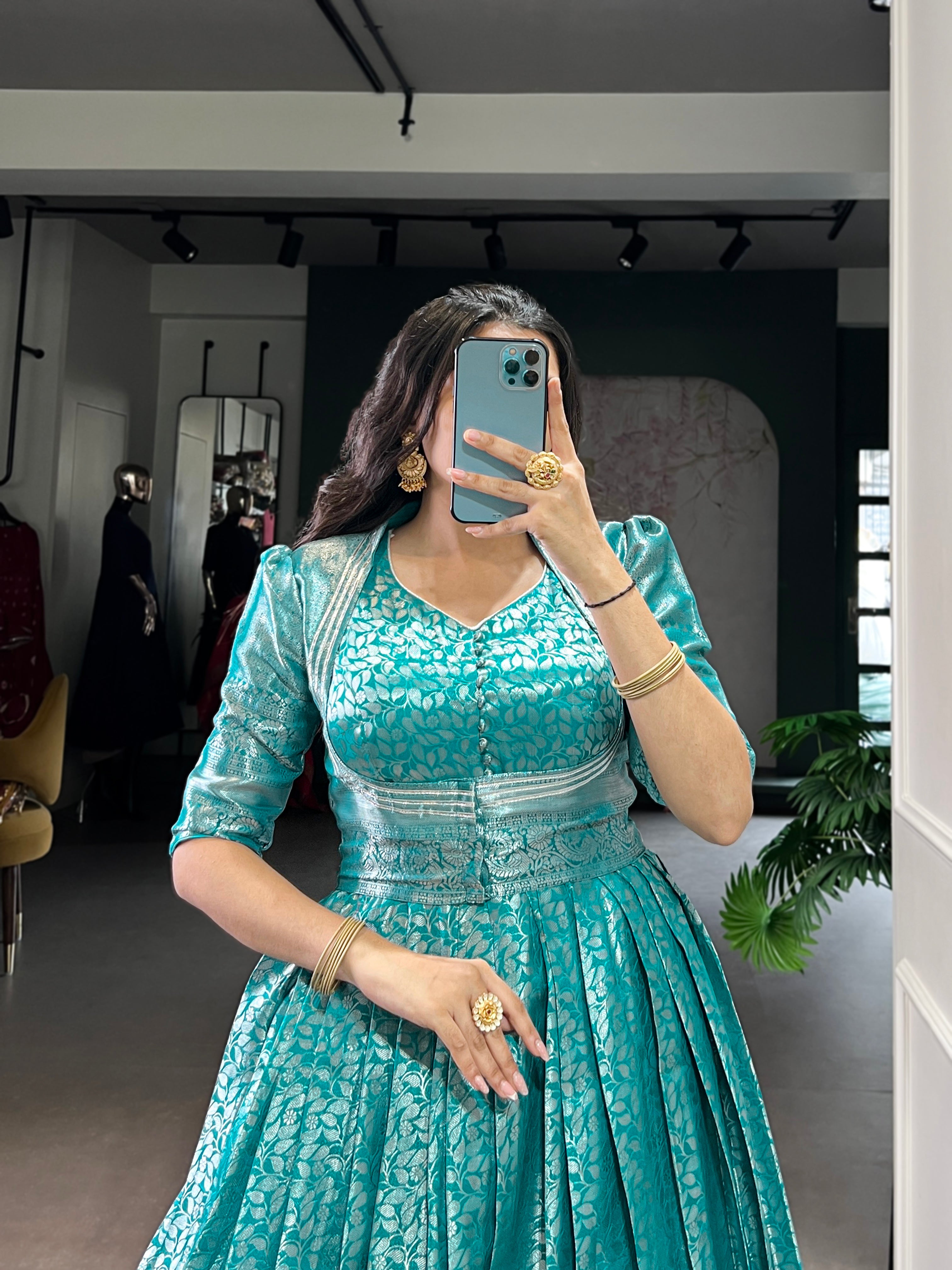 Designer Zari Woven Shrug with Kanjivaram Woven Gown of Teal Colour