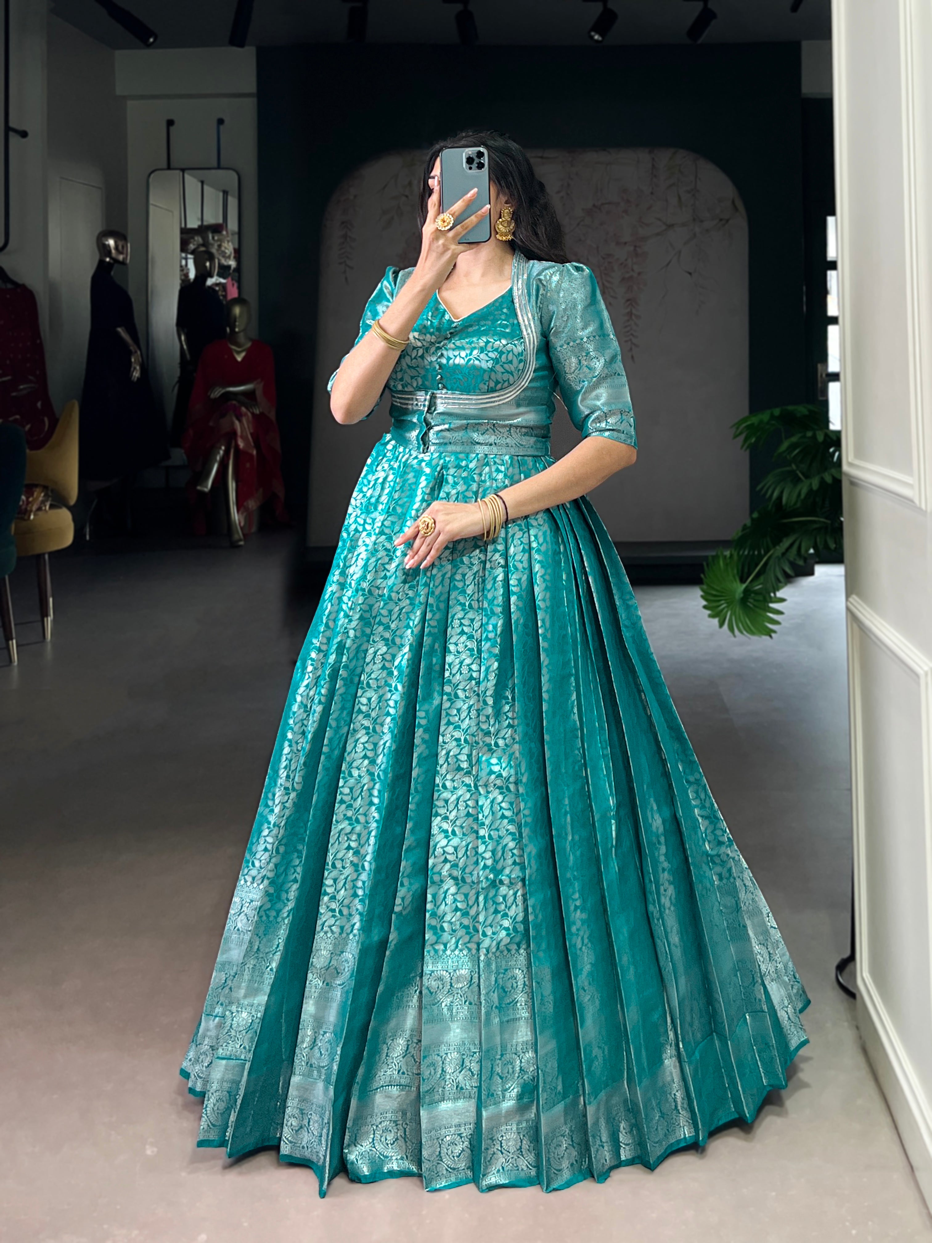 Designer Zari Woven Shrug with Kanjivaram Woven Gown of Teal Colour