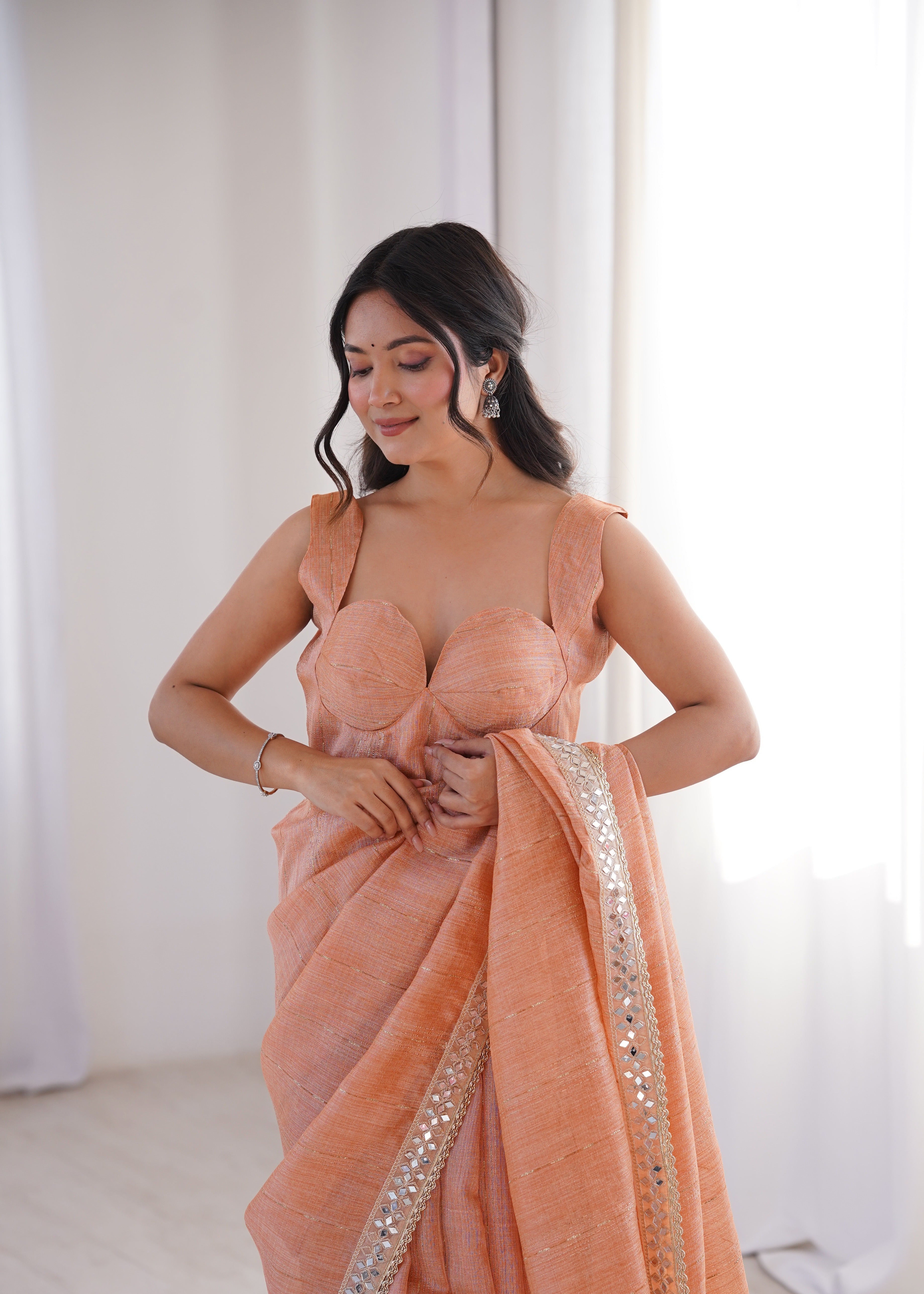 Light Orange Colour Spun Cotton Saree with Embroidered Border with Real Mirror Work