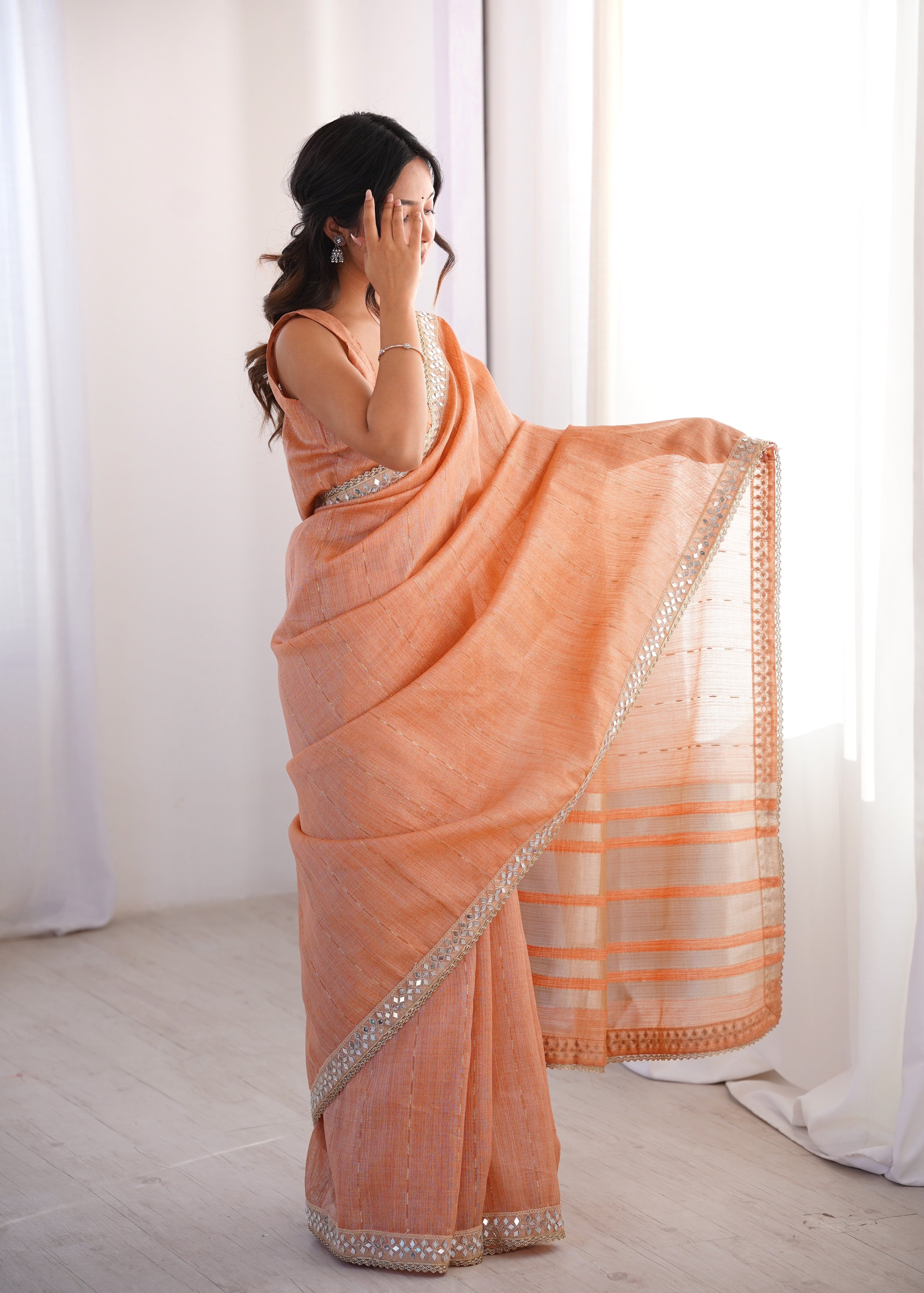 Light Orange Colour Spun Cotton Saree with Embroidered Border with Real Mirror Work