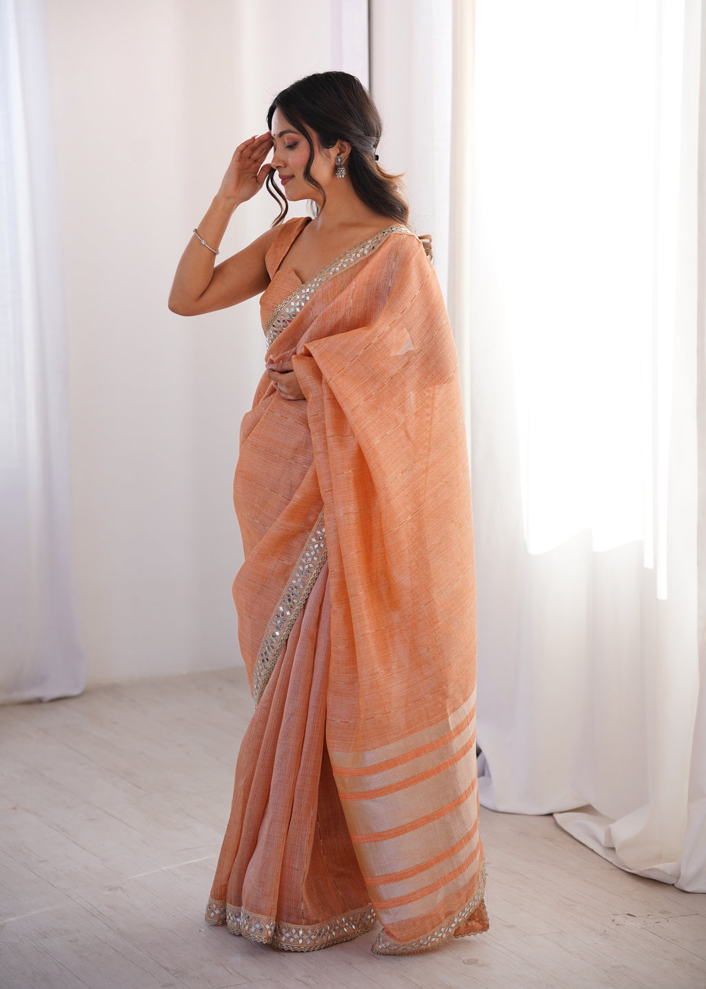 Light Orange Colour Spun Cotton Saree with Embroidered Border with Real Mirror Work