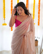 Bollywood Designer Saree of Peach Color. Kalikar